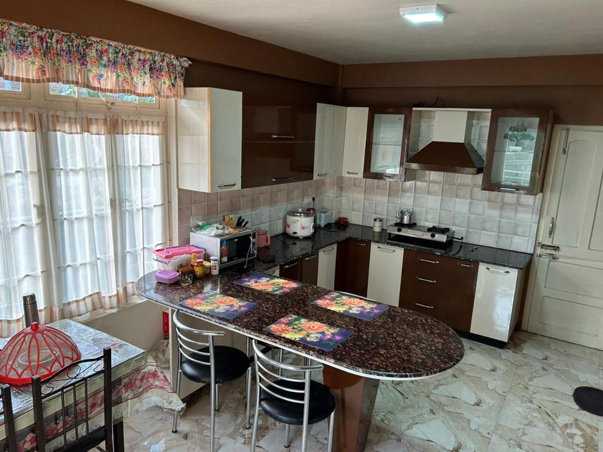 Na-U-Iaka Homestay Шиллонг Экстерьер фото